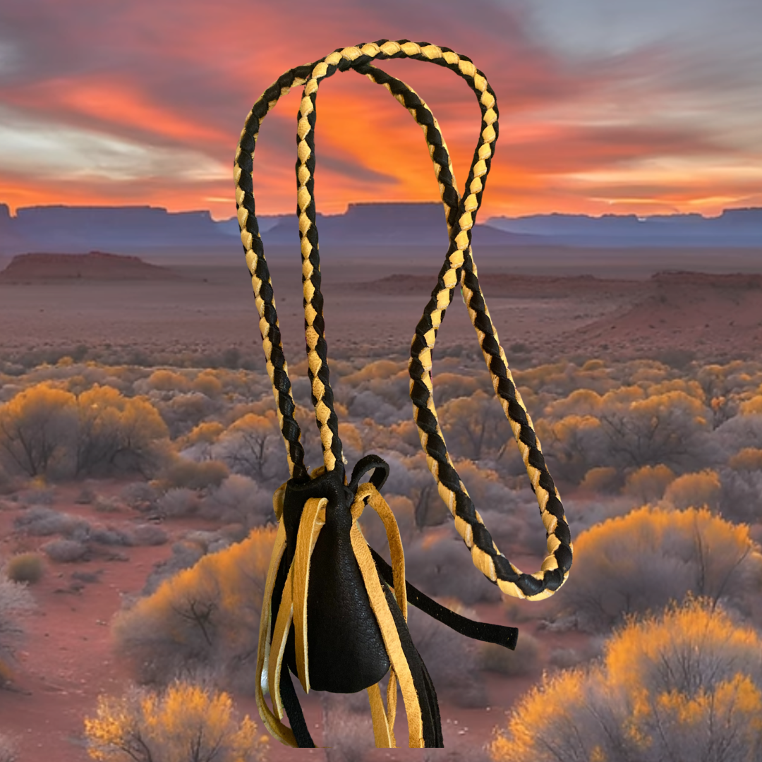 a medicine bag with the background of the dessert and sunset