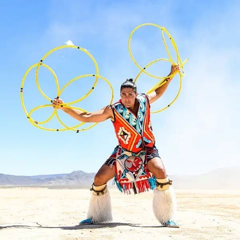 Lumbee hoop dancer, Eric Hernandez, with hoops